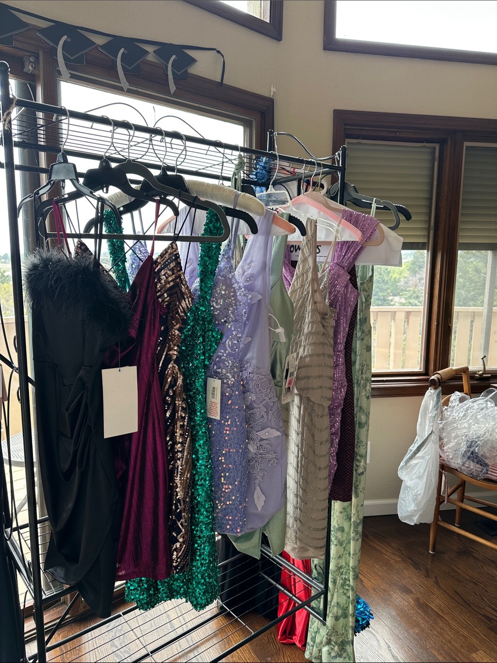 Assorted Formal Dresses in Black, Emerald, Lavender, Purple and Neutral Tones